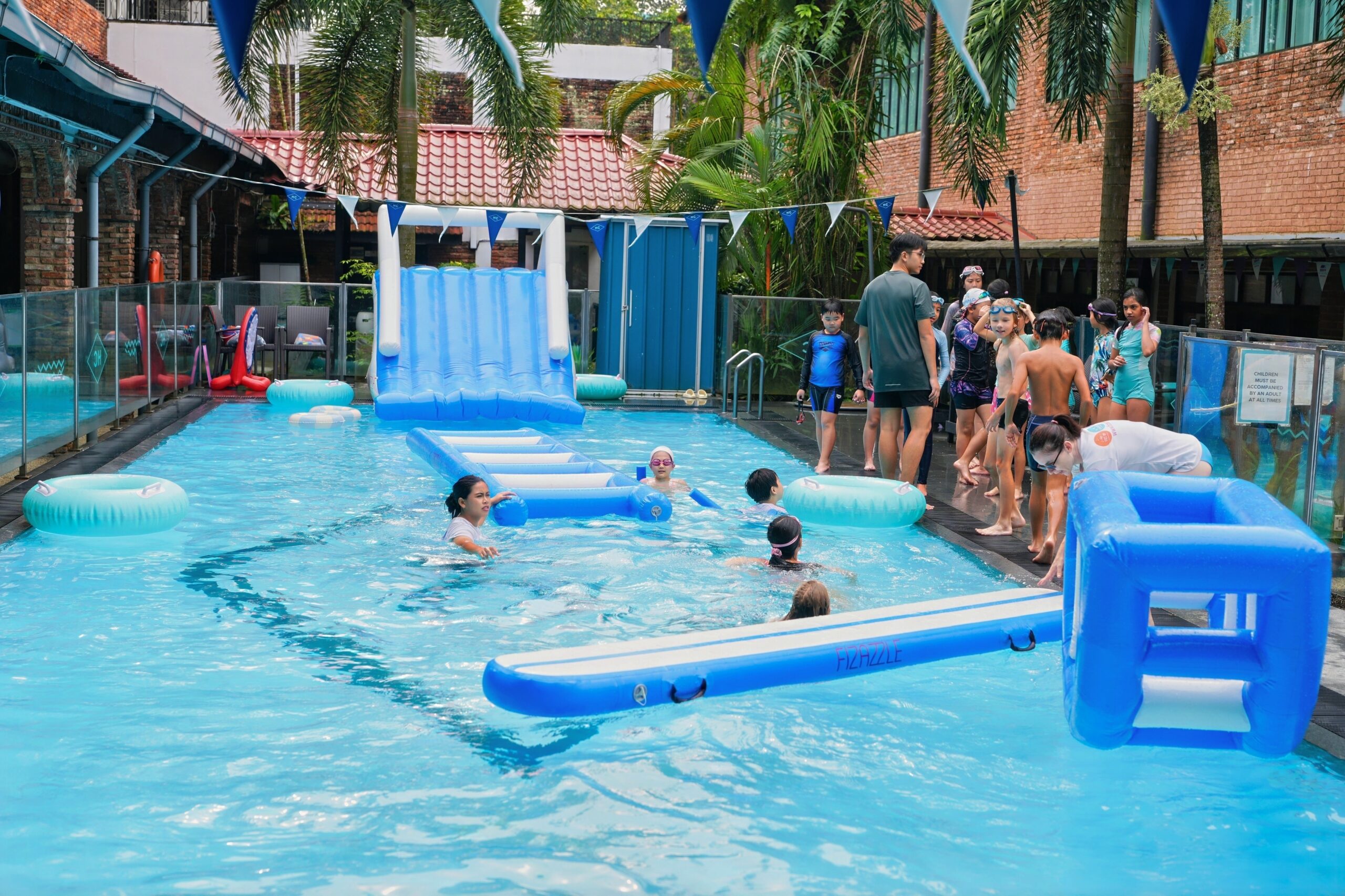 Fizazzle. Pool Party i Singapore. Splash party in Singapore. Water activities. Floats for rent in Singapore. Party planner in Singapore.